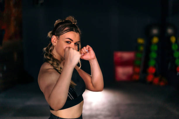 istock Woman in boxing stance 1400488565
