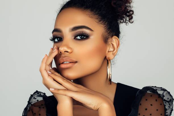 istock Beautiful afro woman with perfect make-up 1400488751