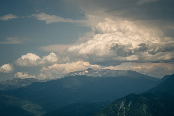 Mysterious black mountain with dramatic cloudy sky