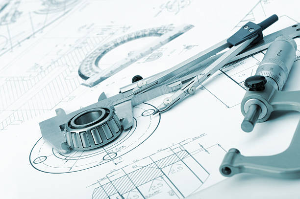 The plan industrial details, a protractor, caliper, divider and The plan industrial details, a protractor, caliper, divider and bearing. A photo closeup. Blue toning picture of protractor stock pictures, royalty-free photos & images