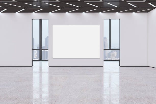 istock Modern empty concrete exhibition hall interior with blank white poster, windows and city view, many doors and mock up place on walls. 3D Rendering. 1400491919