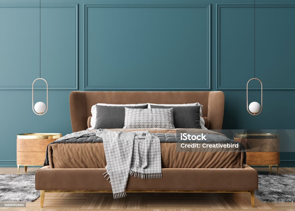 Empty blue wall in modern and cozy bedroom. Mock up interior in contemporary style. Free space, copy space for your picture, text, or another design. Bed, lamps. 3D rendering. Empty blue wall in modern and cozy bedroom. Mock up interior in contemporary style. Free space, copy space for your picture, text, or another design. Bed, lamps. 3D rendering Bedroom Stock Photo