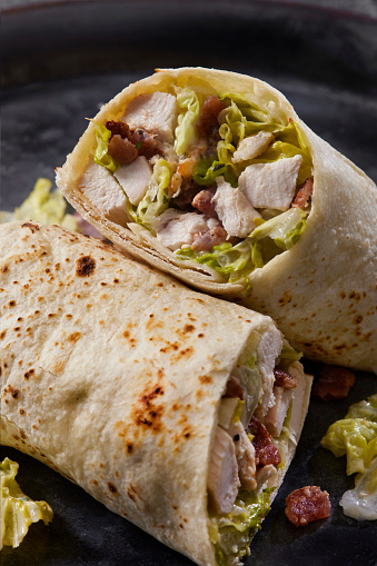 Chicken Caesar Salad Wrap, Roasted Chicken with Romaine Lettuce, Bacon, Parmesan Cheese and Caesar Salad Dressing