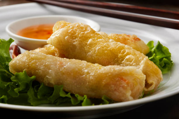 istock Crispy Fried Vietnamese Shrimp and Crap Rice Paper Spring Rolls 1400494450