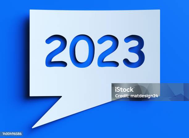 Speech Bubble With 2023 On Blue Background Stock Photo - Download Image Now - 2023, Cut Out, Text