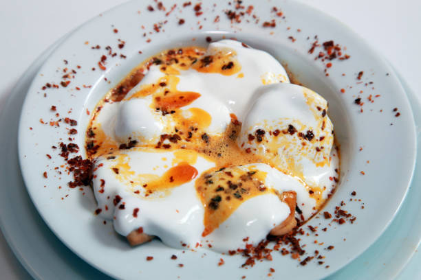 Turkish Ravioli (Manti) with yoghurt stock photo
