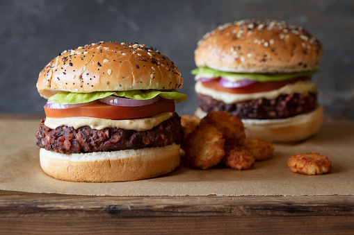 two stacked American vegetarian burgers