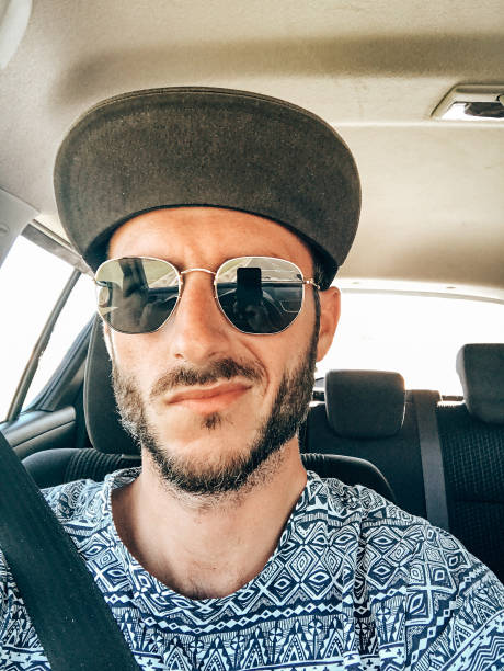 istock man take a selfie on the car 1400500511