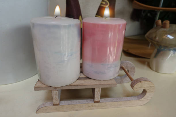 istock Lit decorative candles placed on a sled  Festivities  Party decoration 1400502034