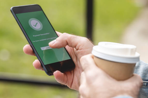 istock Man using mobile smart phone, online payment, banking and online shopping 1400502254