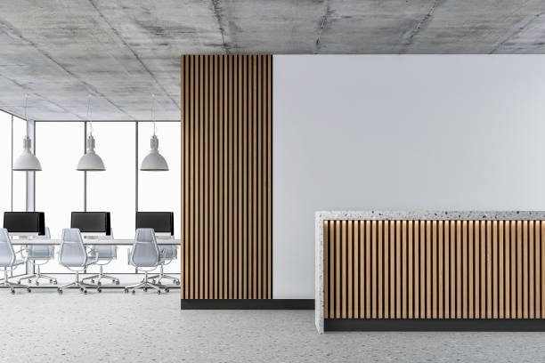istock Empty office interior with copy space, work desks and reception desk on terrazzo floor 1400502467