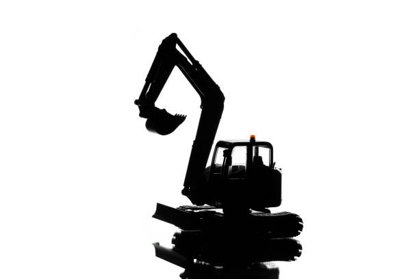 istock excavator model silhouette, isolated on white background 1400503394