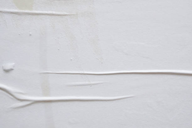istock white crumpled and creased paper poster texture background 1400512180