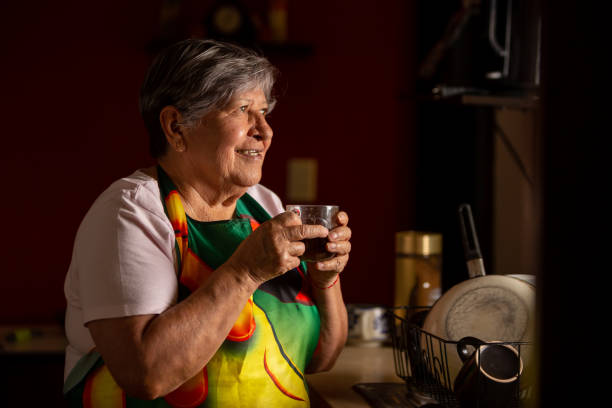 istock Old woman enjoying her coffee 1400521510