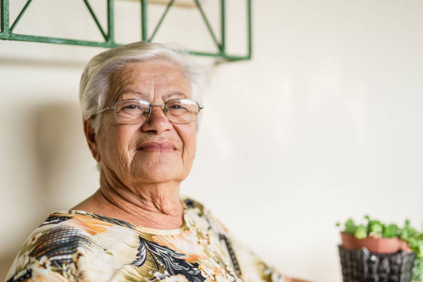 istock Elderly woman at home 1400523332