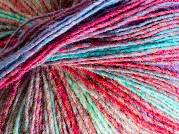 istock Close up of balls of multicoloured wool 1400525410