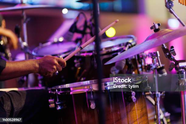 Cropped Image Of A Musician Playing Drum Set On The Stage Stock Photo - Download Image Now