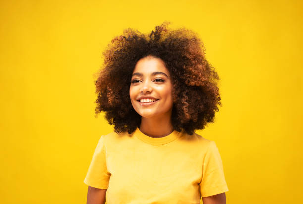 istock Surprised amazed beautiful afro woman with wide open mouth looking at camera, smiling. 1400530765