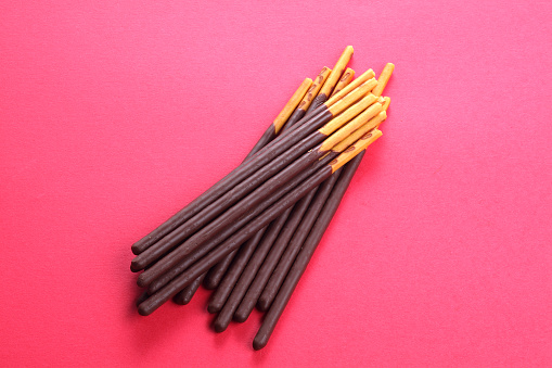 Pocky isolated on red background
