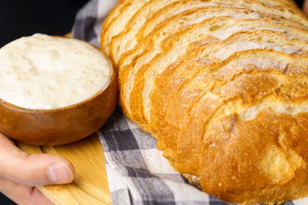 istock Yeast-free sourdough bread. Healthy organic rustic bread. Close up, selective focus 1400537348