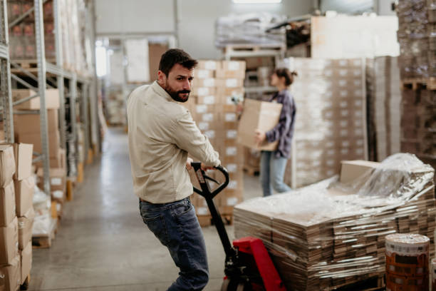istock Packaging and storing together as a team 1400539628
