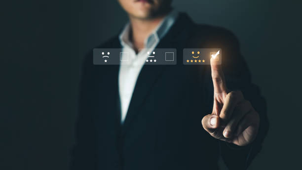 istock User give rating to service experience on online application, Customer review satisfaction feedback survey concept, Customer can evaluate quality of service leading to reputation ranking of business. 1400540750