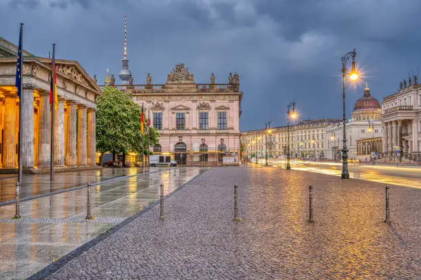 Famous Berlin landmarks at the Unter den Linden boulevard at twilight