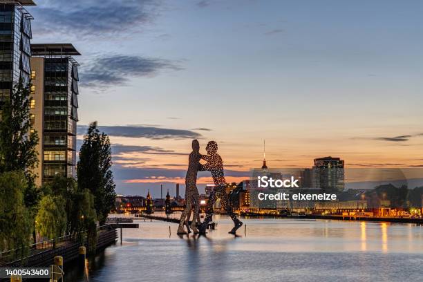 The River Spree In Berlin With The Molecule Men Stock Photo - Download Image Now - Berlin, Kreuzberg, Molecule Men