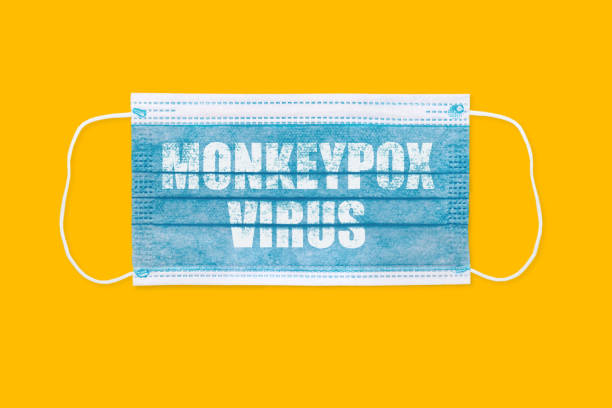 istock Face mask in hand with inscription MONKEYPOX VIRUS 1400543478