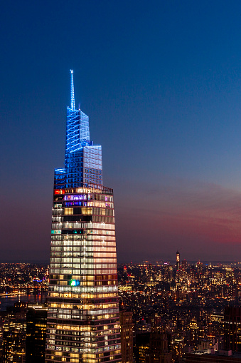Modern Manhattan building illuminated at twilight