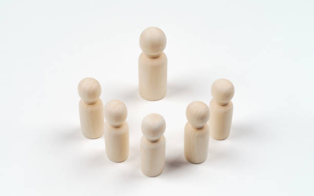 istock Wooden peg dolls on white background. Teamwork, Leadership, Business, human resource management Concept 1400546144