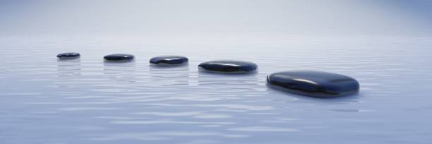 istock Zen pebble float on ocean water surface. Spa wellness, yoga meditation. Holistic therapy. 3d render 1400546227