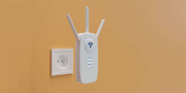 istock Wireless repeater WiFi extender isolated on yellow wall. Internet booster, close up. 3d render 1400546268