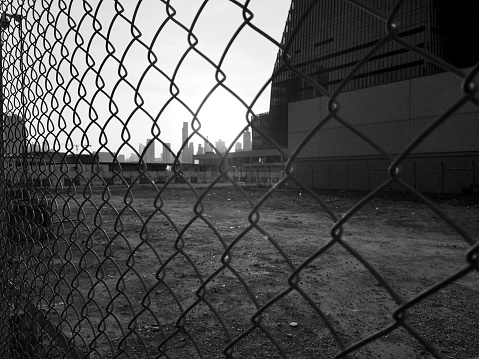 Skyline viewed from a fence at the development area at the former Kai Tak airport in Kowloon peninsula. Hong Kong