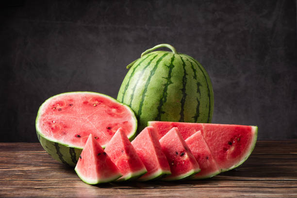 istock fresh sliced watermelon fruit on wooden  background 1400555479