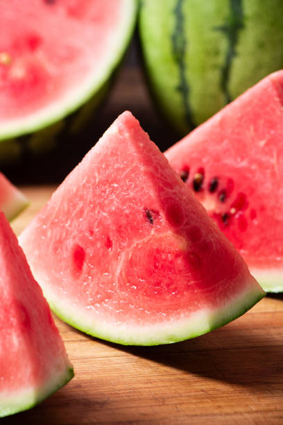 istock fresh sliced watermelon fruit on wooden  background 1400555621
