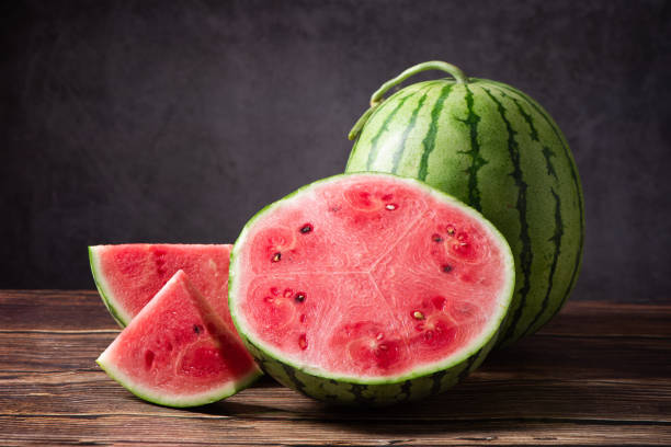 istock fresh sliced watermelon fruit on wooden  background 1400555641