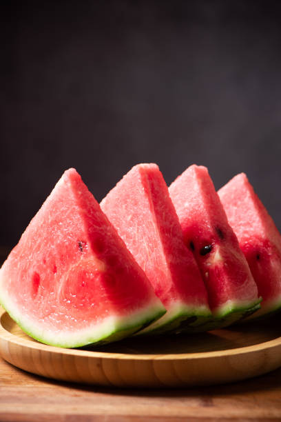 istock fresh sliced watermelon fruit on wooden  background 1400556471