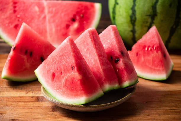 istock fresh sliced watermelon fruit on wooden  background 1400556475