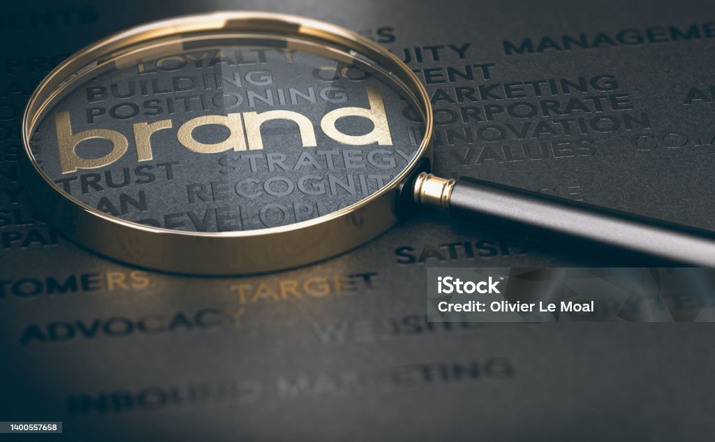 Brand management, Branding or rebranding concept. Brand marketing and management, branding or rebranding concept. 3d illustration of a magnifying glass over golden and black words. Advertisement Stock Photo
