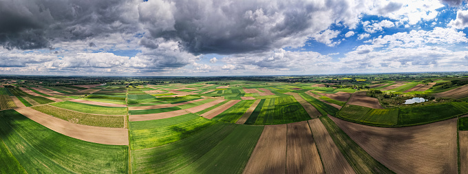 Colorful Farm Fields in Poland at Spring. Aerial Drone Panorama.