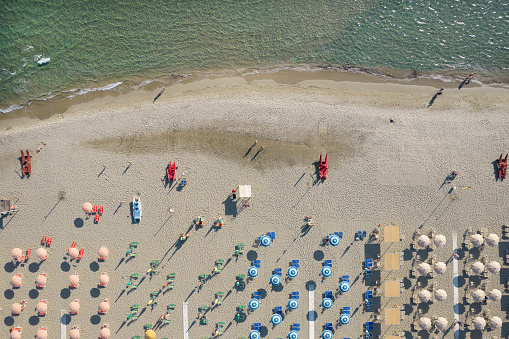 Aerial view of the equipped beach of Lido di Camaiore Tuscany photographed in the late afternoon