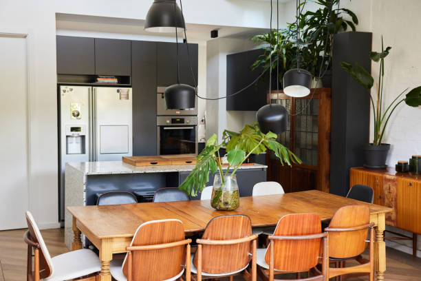 istock Dining area and kitchen in a modern open plan home 1400562373