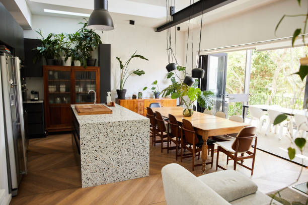 istock Modern kitchen and dining area in an open plan home 1400562433