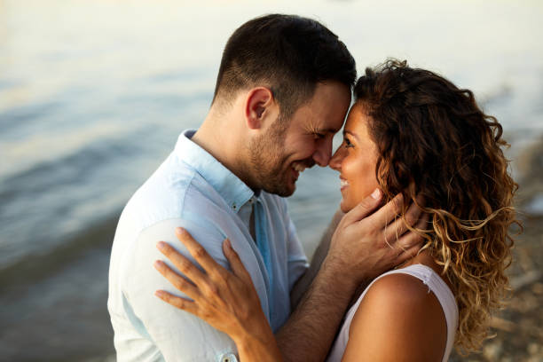 istock Couple in love by the river 1400563158