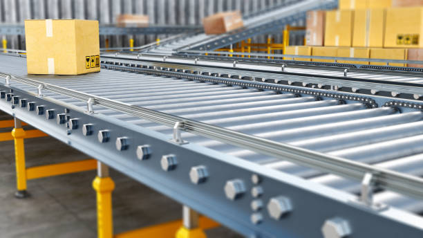 Metallic conveyors with boxes are stretching far away, stack of boxes is near, 3d illustration stock photo