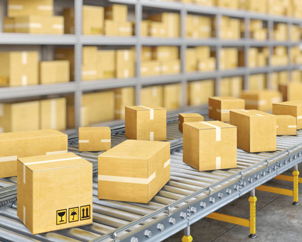 istock Boxes move in line on the conveyor belts stayed close to each other, blurred shelf with boxes aside, 3d illustration 1400564716