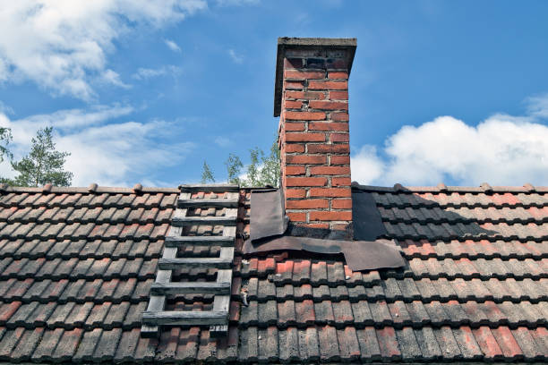 istock old chimney with wooden ladder on roof 1400565092
