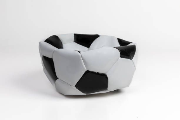 istock Deflated Soccer Ball on White Background 1400567221