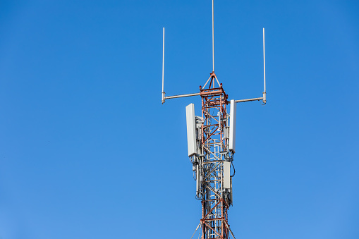 Cell Phone Tower on a day with blue sky